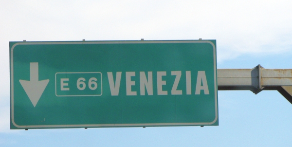 Driving Italian autostrada green sign