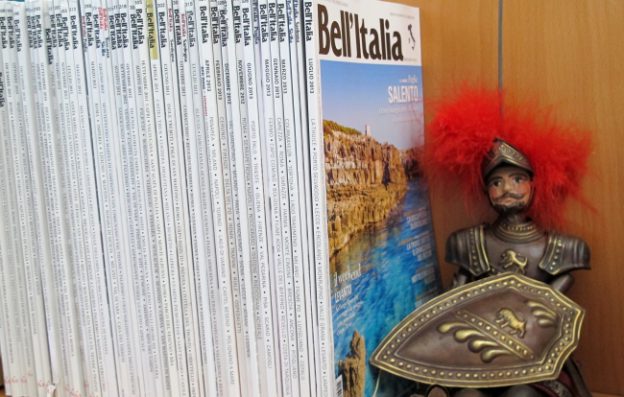 Bell'Italia magazines with Sicilian puppet